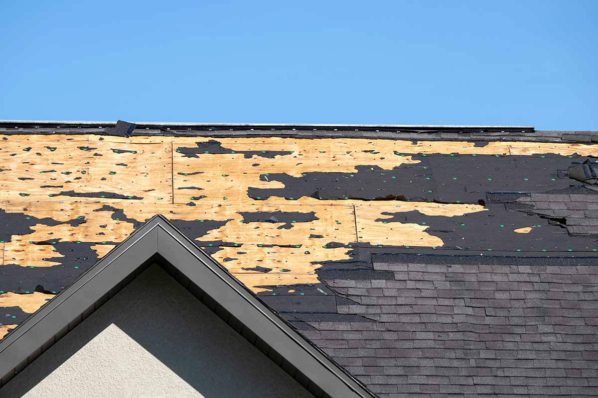 A roof with most of the shingles removed